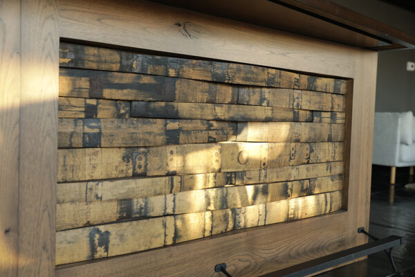 A panel of pristine wood with an inset of contrasting weathered wood.